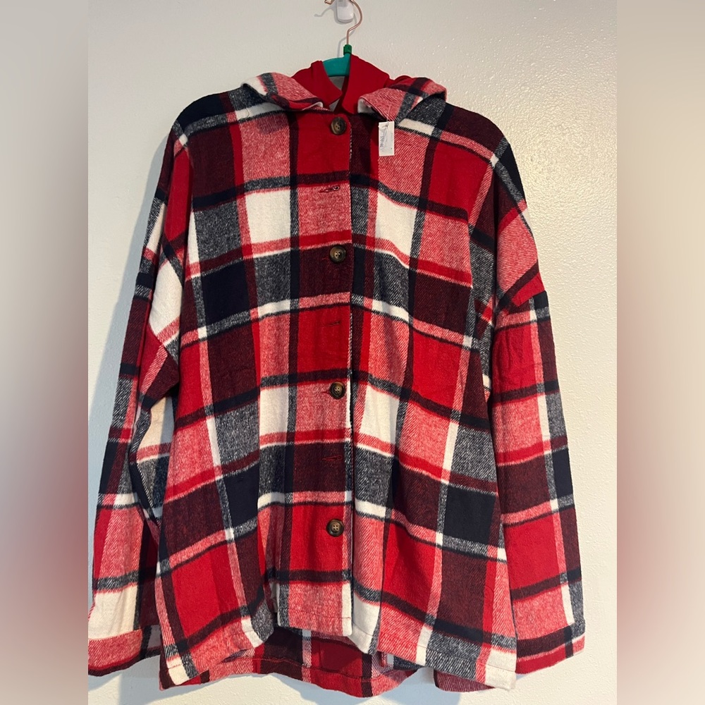 All new women’s tops. Size XL/L